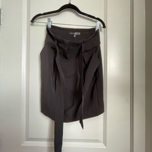 Black mini skirt with paper bag waist and tie detail